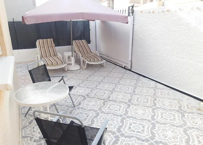 Con Patio Y Terraza Solárium